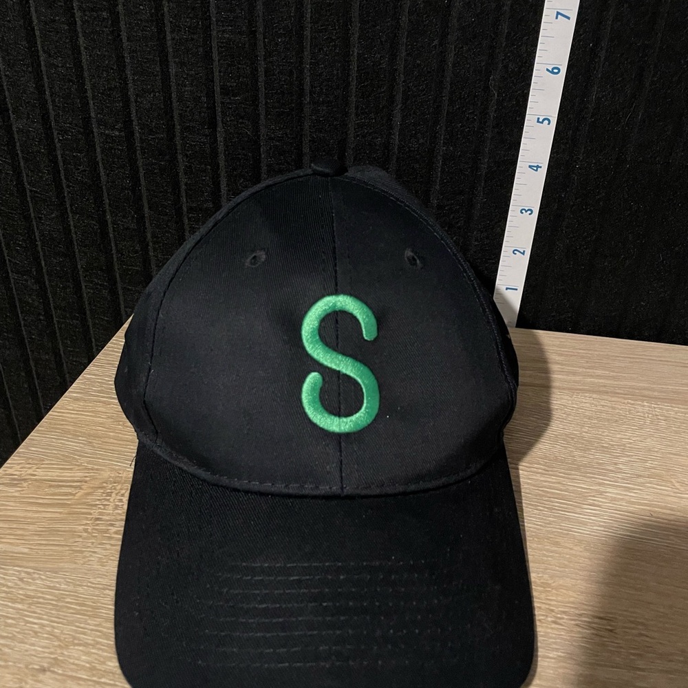 Genuine‎ Merchandise Black Hat with Green Logo